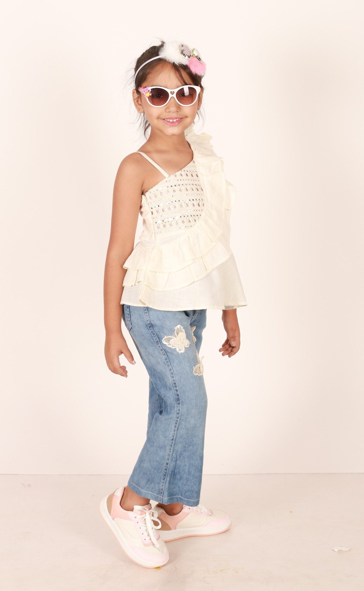 Twisha Girls One Sided Frilled Top & Jeans Embellished With Beautiful Butterfly Patches - Off White & Blue